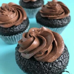 Chocolate cupcakes prepared with two types of cocoa filled with a European chocolate mousse or can be filled with decadent chocolate ganache.