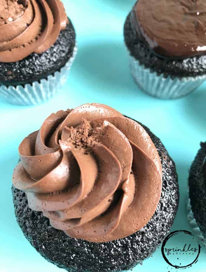 Chocolate cupcakes prepared with two types of cocoa filled with a European chocolate mousse or can be filled with decadent chocolate ganache.